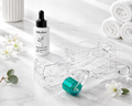 SilkyBare hyaluronic acid serum with a micro-needing derma roller - use for anti-aging on sagging skin.