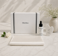 SilkyBare skincare products includes mulberry silk pillowcase, hyaluronic serum, white quartz Gua Sha stone with gift box