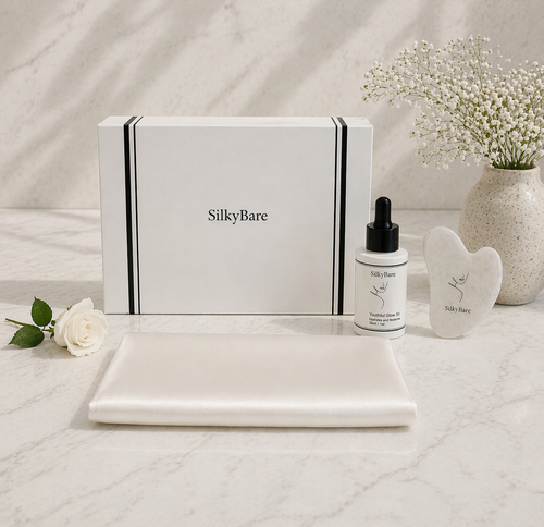 SilkyBare skincare products includes mulberry silk pillowcase, hyaluronic serum, white quartz Gua Sha stone with gift box